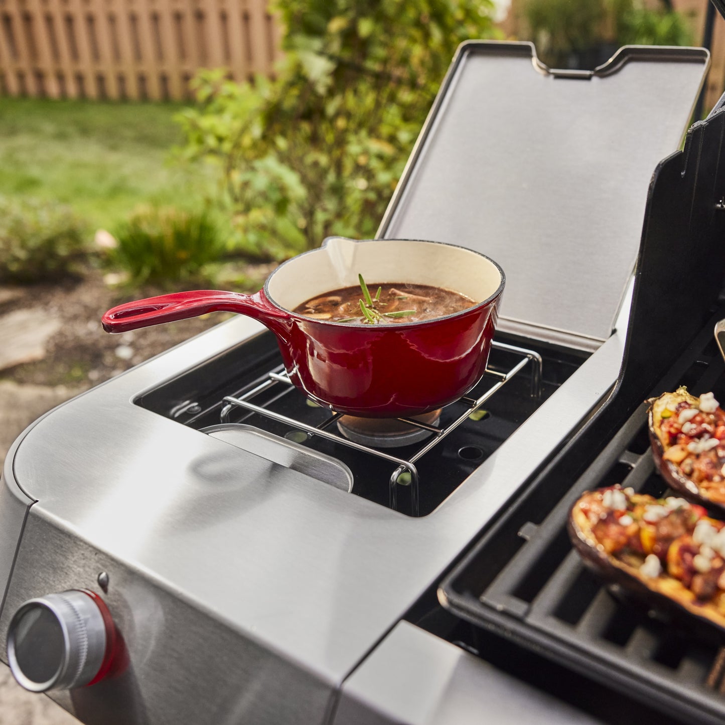 Weber Genesis E-335C BBQ with Cast Iron Grill Grates and Side Burner